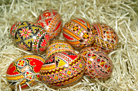 floral egg decors on brown hay thumbnail