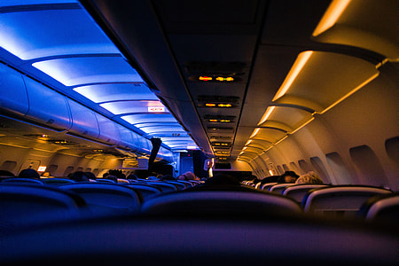 Interior of airplane with passengers thumbnail