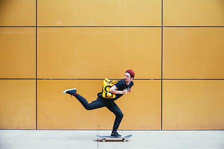 Skateboarder Rides Past Photo thumbnail