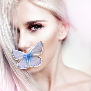 common blue butterfly and woman thumbnail