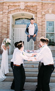 man jumping in front of mans thumbnail