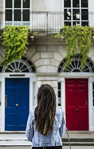 woman in-front of house thumbnail