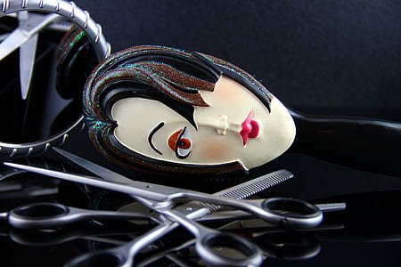 beige, black, and brown brush on stainless steel scissors thumbnail