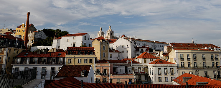 white and red buildings at daytime thumbnail
