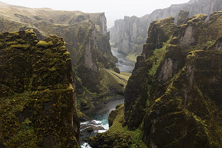 river surrounded by green mountains thumbnail