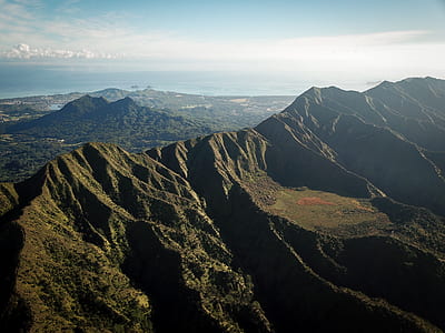 bird's-eye view photo of green mountain thumbnail