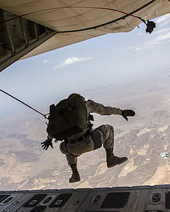 man jumping on aircraft thumbnail