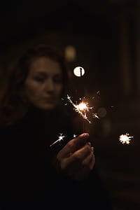 woman holding fire cracker thumbnail