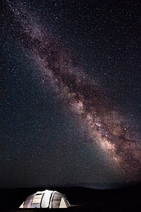 cabin tent under starry night wallpaper thumbnail