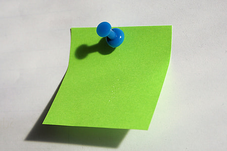 green sticky note pinned with push pin thumbnail