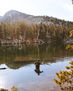 man fishing in the river thumbnail
