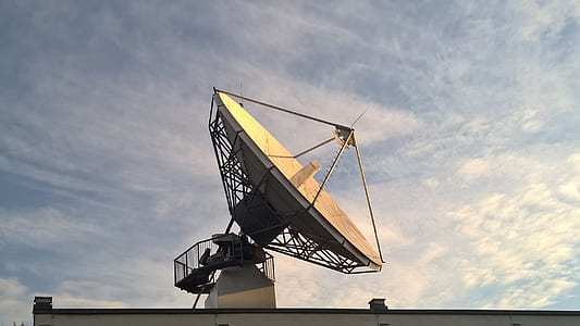 gray satellite under cloudy sky thumbnail