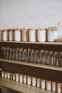 jar on shelf beside wall thumbnail