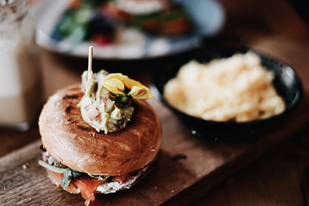 hamburger on brown wood plank thumbnail