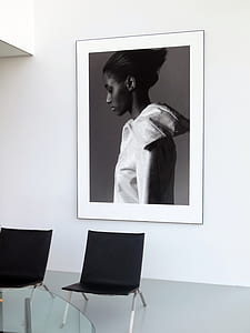 painting of woman in white dress and two black chairs thumbnail