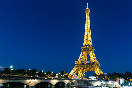 Wide angle night-time shot featuring the iconic Eiffel Tower in Central Paris, France. Image captured with a Canon 6D thumbnail