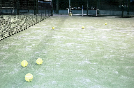 tennis balls on tennis court thumbnail