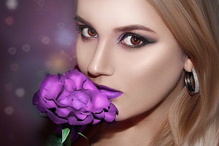 closeup photo of woman kissing purple rose wallpaper thumbnail
