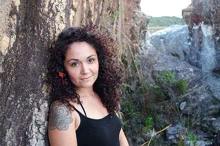 woman leaning on rock thumbnail