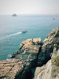 white cruise ship on sea during daytime thumbnail