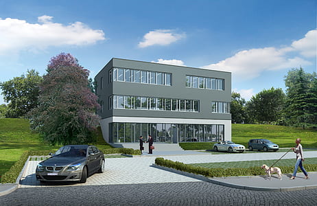 gray BMW sedan parked on driveway near building concept thumbnail