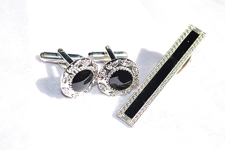 pair of silver-colored accessories thumbnail