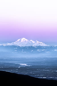 snowcapped mountain at daytime thumbnail