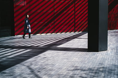 woman walking on brick flooring thumbnail