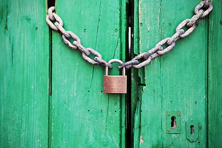 brass padlock and grey chain thumbnail