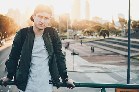 man standing on bridge thumbnail