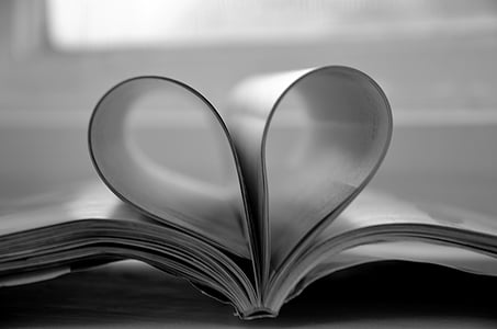 gray opened book page forms heart thumbnail