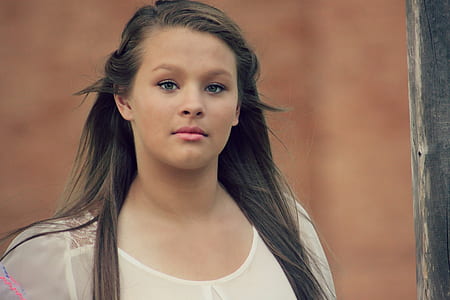 girl wearing white scoop-neck top thumbnail