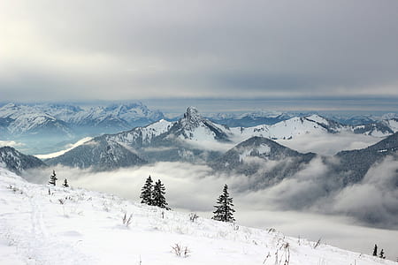 aerial view photography of mountain covered by fog thumbnail