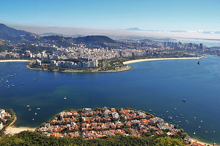 aerial view photography of buildings in island thumbnail