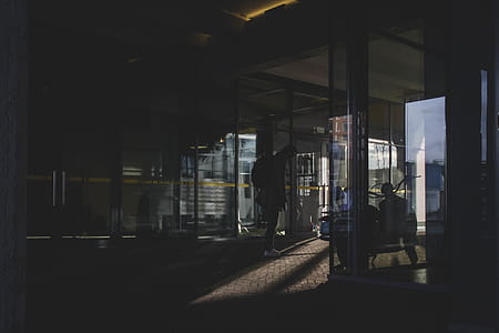 People in a Building With Glass Walls thumbnail