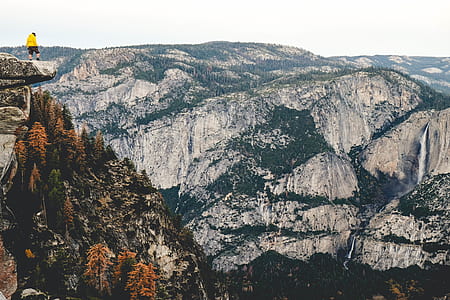 person standing on mountain thumbnail