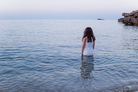 woman standing on sea thumbnail