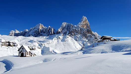 snow covered mountain during daytime thumbnail