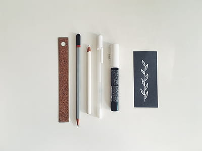 pen and marker on surface thumbnail