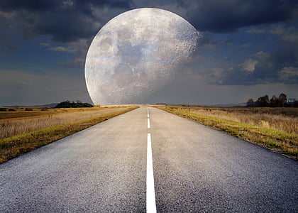 roadway between grass field in front of moon digital wallpaper thumbnail