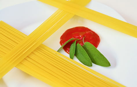 pasta with green herbs on plate thumbnail