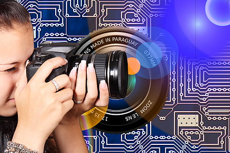 black DSLR camera thumbnail
