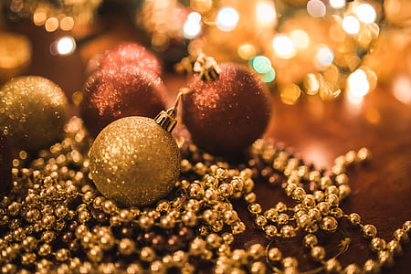 selective focus photo of gold baubles thumbnail