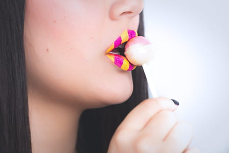 Woman Holding a Lollipop thumbnail