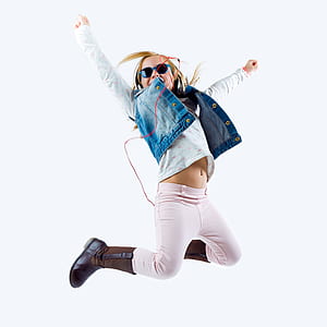 woman wearing blue denim vest jumping thumbnail