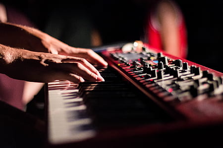 person playing electronic keyboard thumbnail