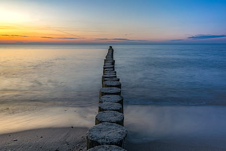gray concrete pathway during daytime thumbnail