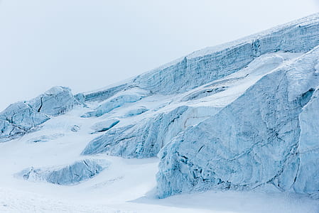 hill covered with snow at daytime thumbnail