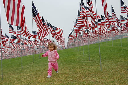 girl running near USA flag lot thumbnail