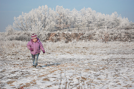 toddler walking on grass thumbnail